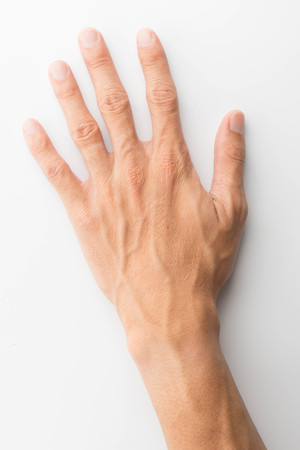 man open hand with french manicure isolated on a white backgroundの写真素材