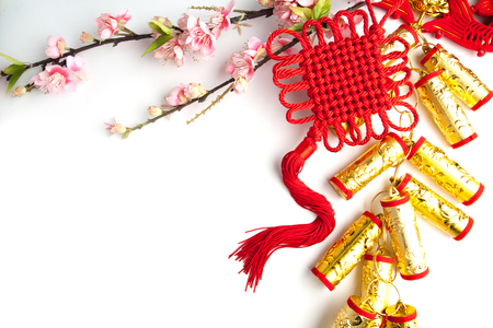 chinese new year festival decorations plum flowers on white with copy spaceの写真素材