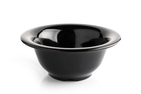 Black bowl isolated on white backgroundの写真素材