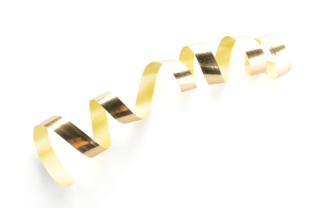Golden ribbon roll isolated on white backgroundの写真素材
