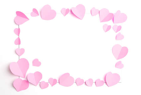 Pink paper hearts isolated on white background