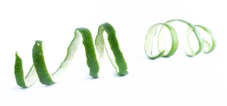 green lemon twist on white backgroundの写真素材