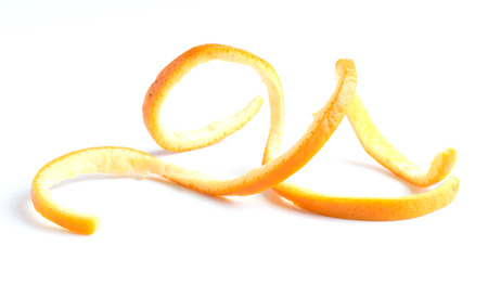 orange mandarin lemon twist isolated on whiteの写真素材