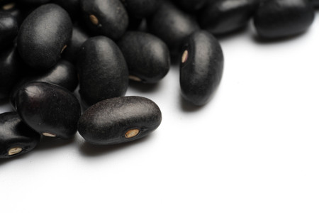 black beans isolated on white backgroundの写真素材