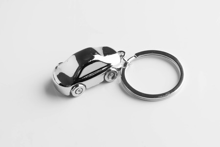 key chain in the form of a car isolated on white backgroundの写真素材