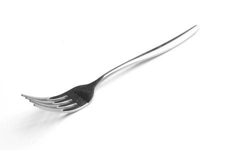 top view of a generic metal fork isolated on a white backgroundの写真素材