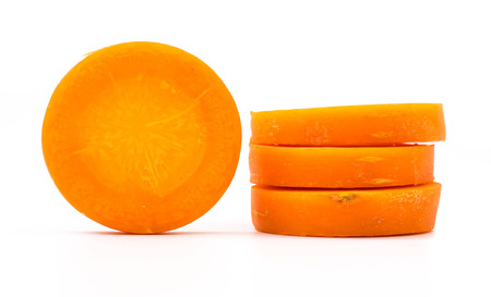 carrot slice isolated on white backgroundの写真素材