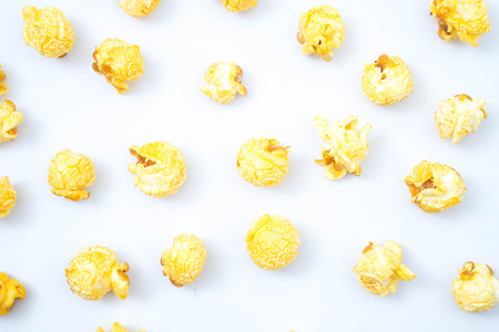 popcorn in bucket on white backgroundの写真素材