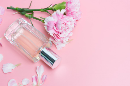 Beautifulperfume bottles on pink background
