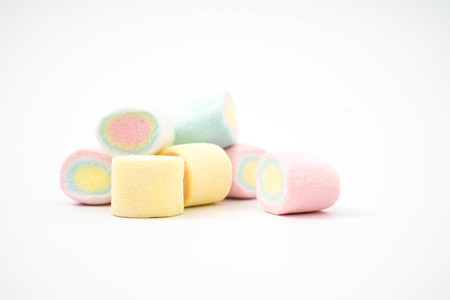 Colorful marshmallows candy isolated on whiteの写真素材