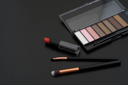 make up  and brushes  on black backgroundの写真素材