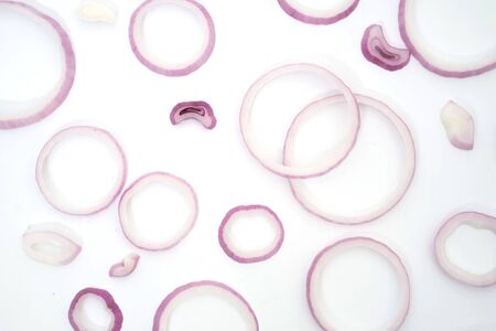 sliced red onions set isolated on white background top viewの写真素材