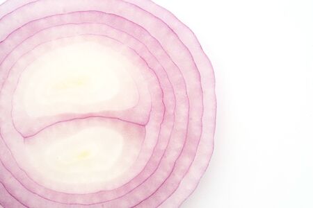 closeup sliced red onions set isolated on white background top viewの写真素材