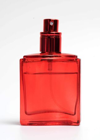 red perfume bottle isolated on white backgroundの写真素材
