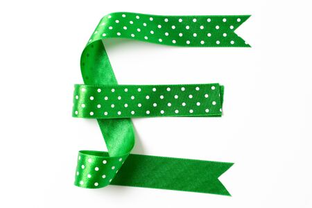 E alphabet letter font green ribbons label on white backgroundの写真素材