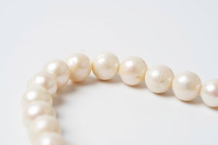 pearl necklace isolated on white blackgroundの写真素材