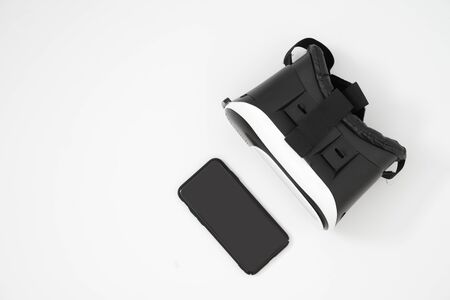 Vr box virtual reality glasses and mobile isolated on white
