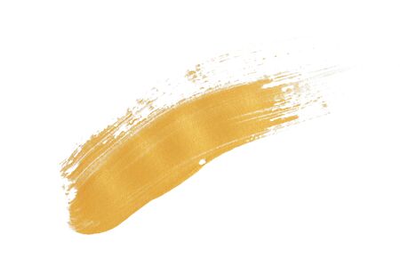 gold texture paint stain on white backgroundの写真素材