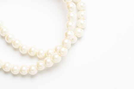 pearl necklace isolated on white blackgroundの写真素材