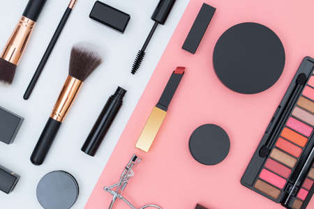 set decorative cosmetics on pink and whiteの写真素材