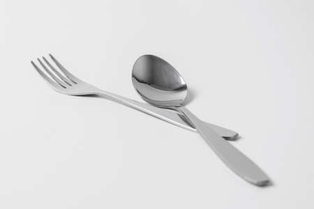 fork spoon isolated on white backgroundの写真素材