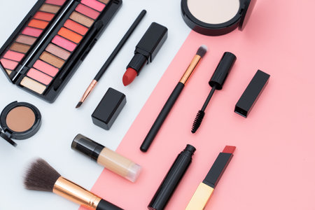 set decorative cosmetics on pink and whiteの写真素材
