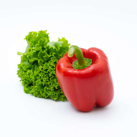 Red bell peppers isolated on white backgroundの写真素材