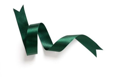 A roll green ribbon isolated on white backgroundの写真素材