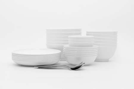 set clean dishes glasses on white backgroundの写真素材