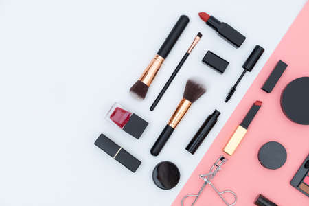 set decorative cosmetics on pink and whiteの写真素材