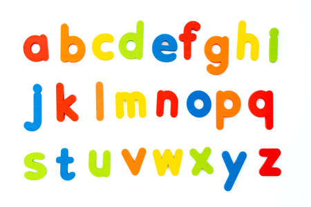 colorful wood abc letters isolated on white backgroundの写真素材