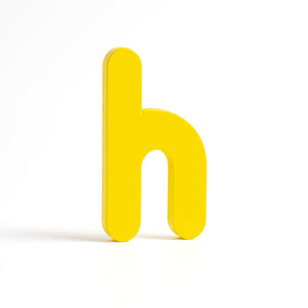colorful wood h letters isolated on white backgroundの写真素材