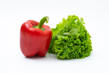 Red bell peppers isolated on white backgroundの写真素材