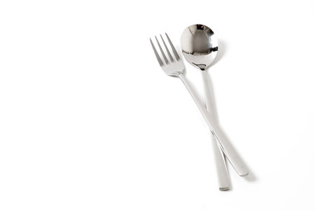 silver spoon and fork isolate on white backgroundの写真素材