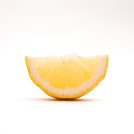 lemon fruit leaf isolate half on white backgroundの写真素材