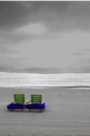 empty beach chairs stormy skyの写真素材