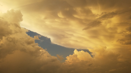 Storm clouds at sunsetの写真素材
