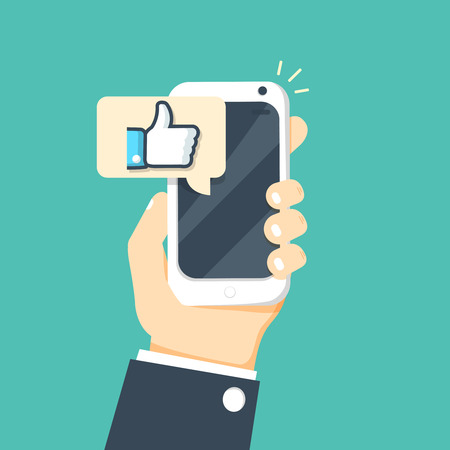 Hand holding smartphone with like message on screen, like button. Thumbs up icon.のイラスト素材