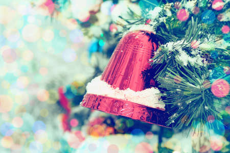 Delicate vintage Christmas background with a bell.の写真素材