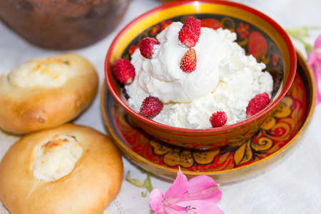 Homemade milk cream, cottage cheese, yogurt and fresh pastries.