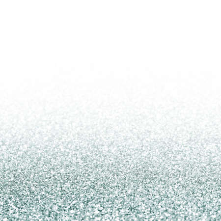 Shiny silver background with sparkles and flares.の写真素材