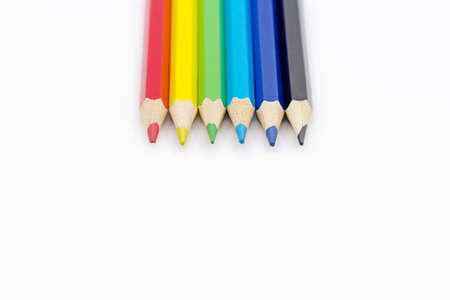 Set of colored pencils on a white background.