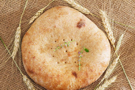 Homebaked bread. Yeast-free cake and ears. Ciabatta close up.