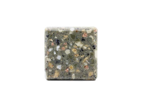 Artificial finishing stone. Finishing tile. Sample on a white background. Quarry canyon.の写真素材