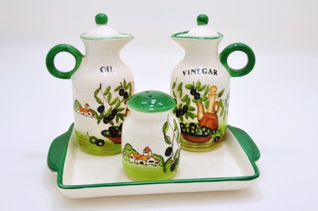 White ceramic container for vinegar and oil with beautiful drawingsの写真素材
