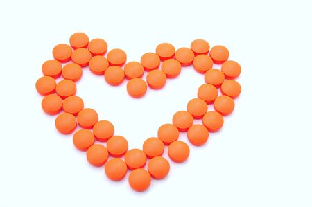 Many colored medication on a clean white backgroundの写真素材