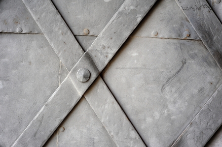 Detail of an old metal gate の写真素材