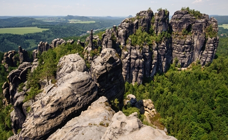 A view of schrammsteine and forests in Saxon Switzerlandの写真素材