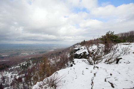 Winter landscape covered with snow and snow cloudsの写真素材
