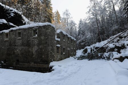 Dolsky mill in the Czech Switzerland with snow and frostの写真素材